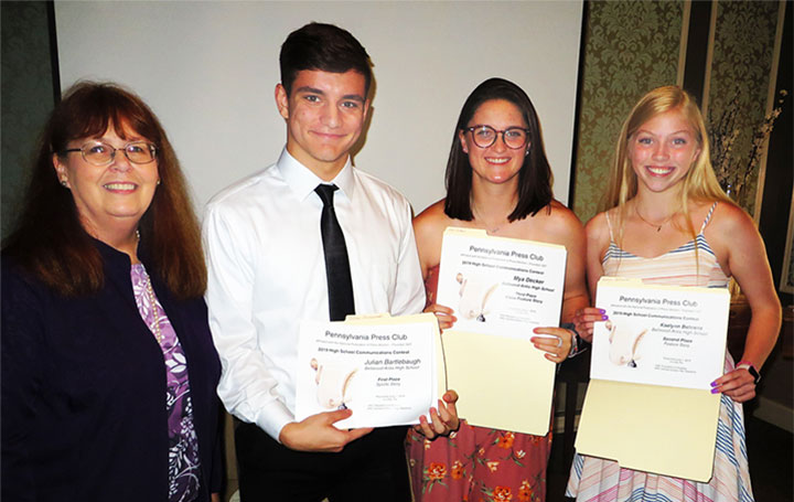 Contest director Kay Stephens with Bellwood-Antis High School winners Julian Bartlebaugh, Mya Decker and Kaelynn Behrens at the June 1, 2019 PPC Awards Luncheon.