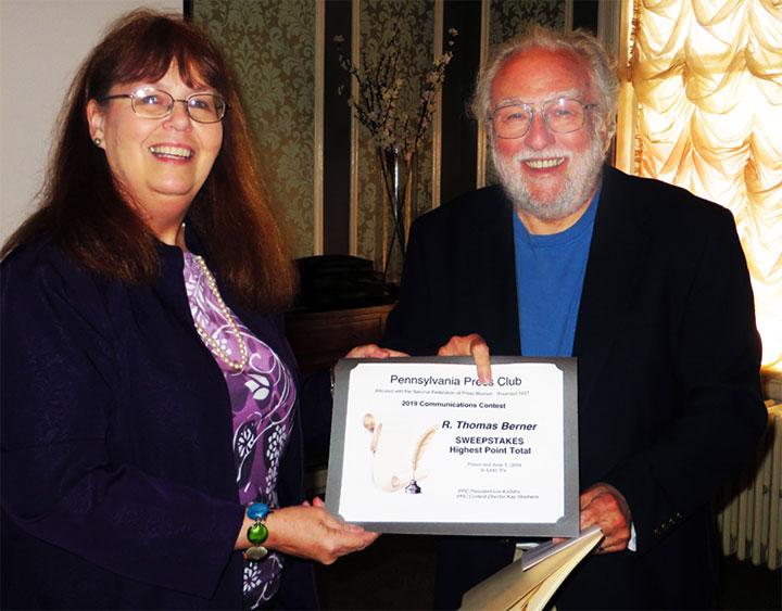 Kay Stephens presents R. Thomas Berner with the Sweepstakes Award given to the entrant with the highest point total at the June 1, 2019 PPC Awards Luncheon.